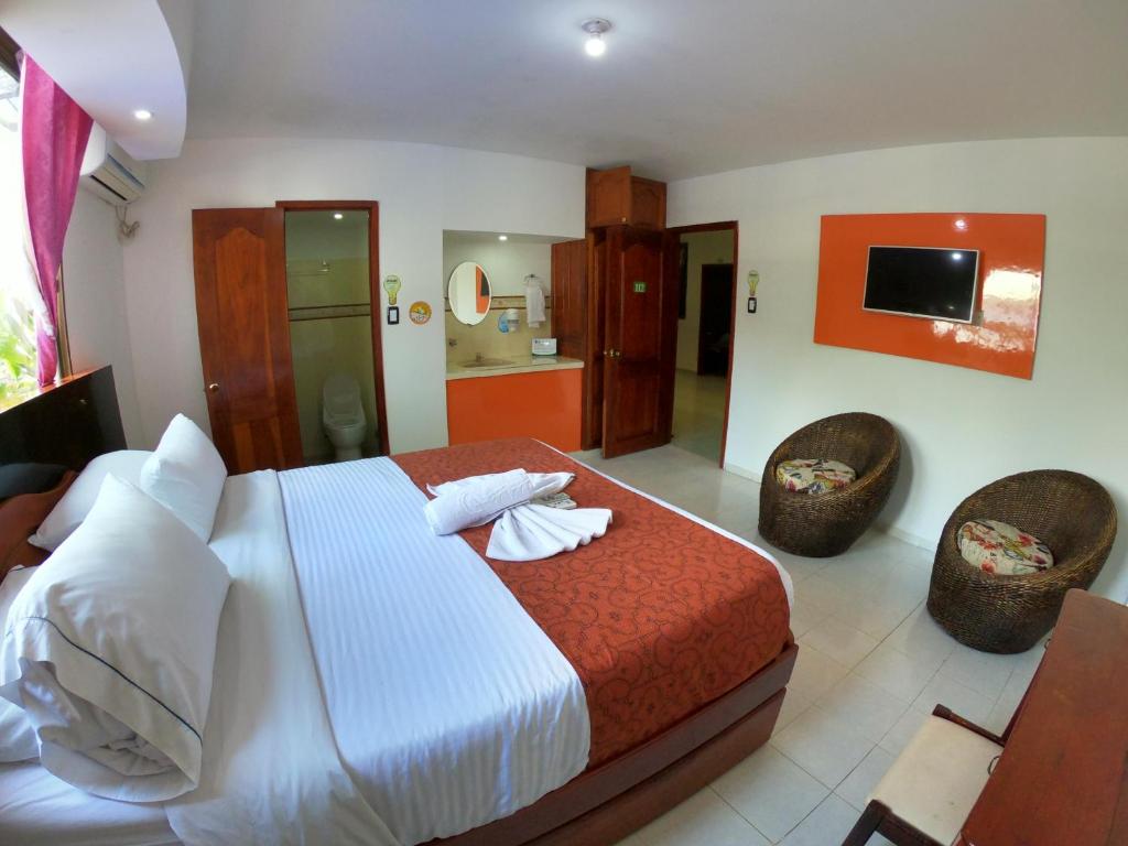 Postel nebo postele na pokoji v ubytování Hotel Yurupary AMAZONAS