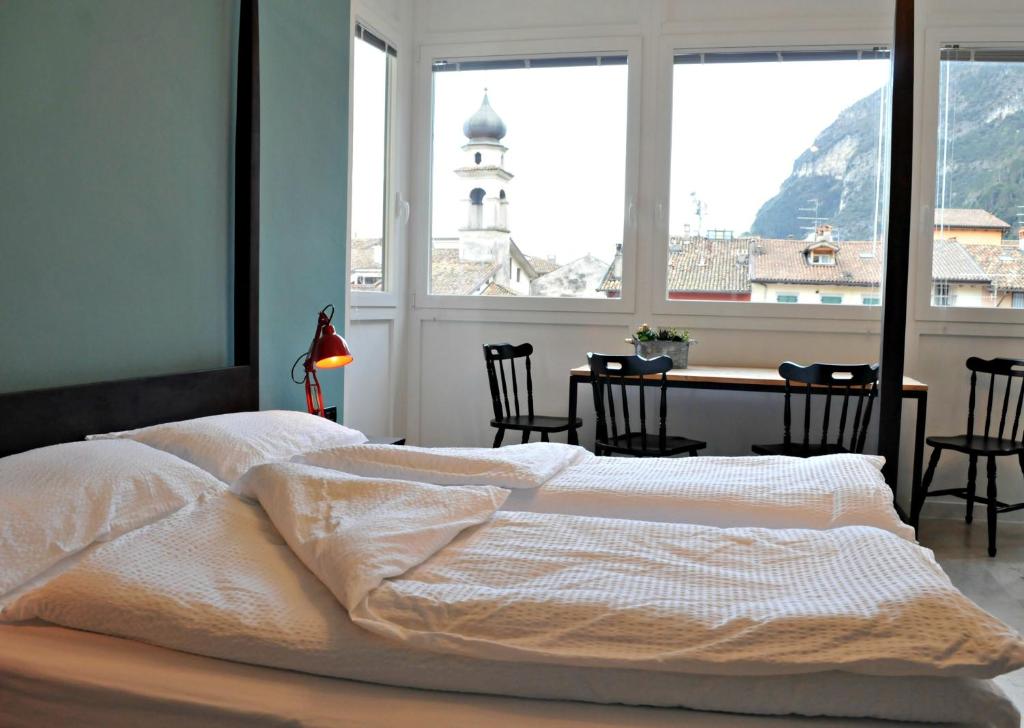 Posteľ alebo postele v izbe v ubytovaní Riva City View