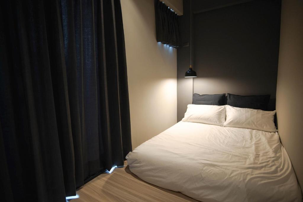 Postel nebo postele na pokoji v ubytování Spangle Inn