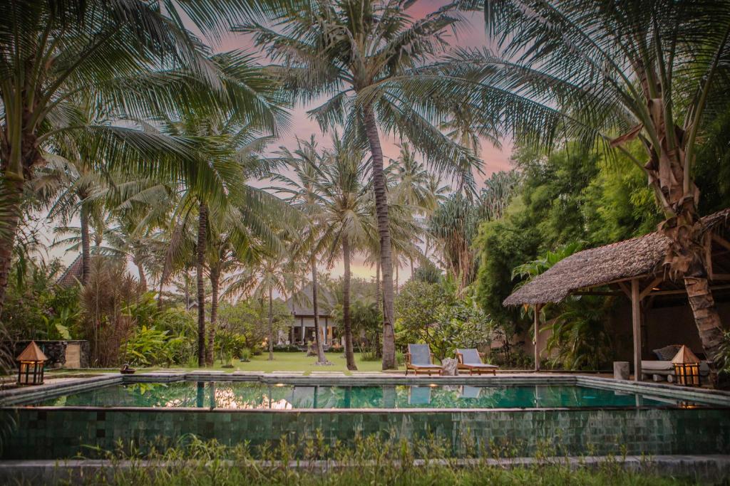 Bazén v ubytování Beach Villas Lombok nebo v jeho okolí