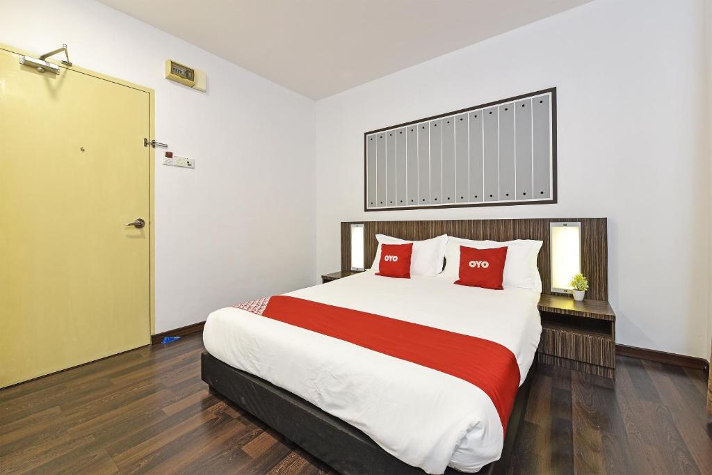 Postel nebo postele na pokoji v ubytování 4S Hotel
