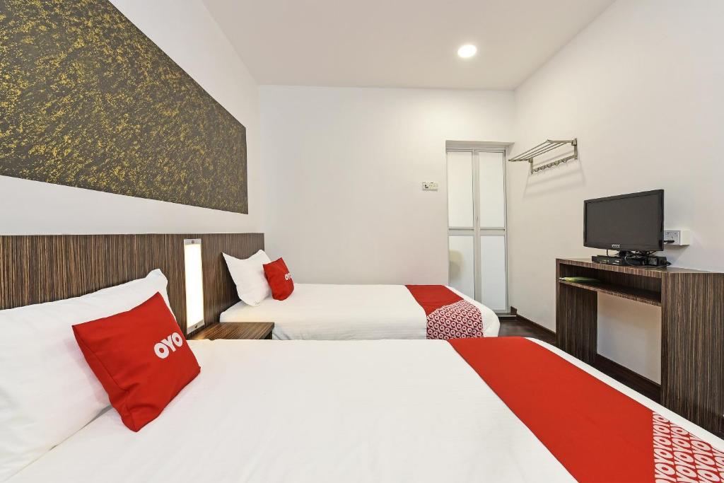 Postel nebo postele na pokoji v ubytování 4S Hotel