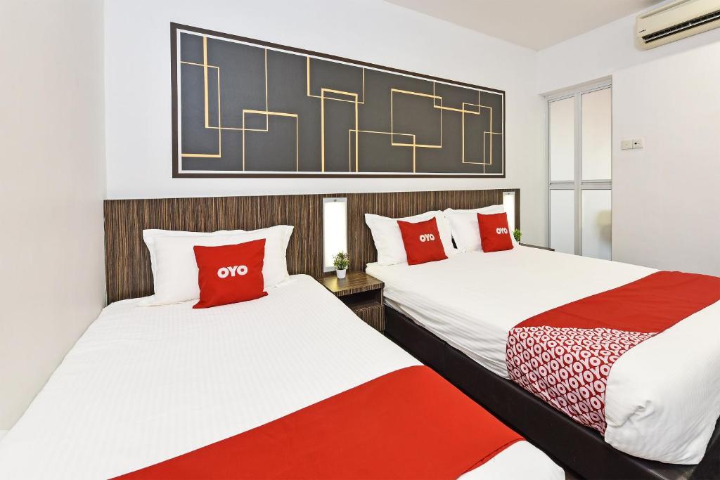 Postel nebo postele na pokoji v ubytování 4S Hotel