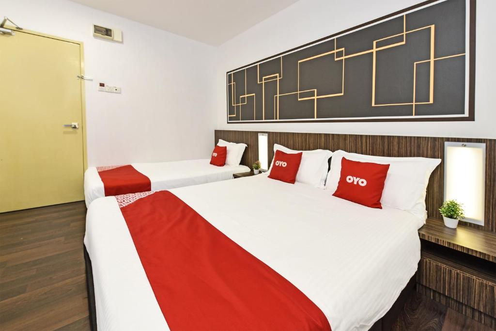 Postel nebo postele na pokoji v ubytování 4S Hotel
