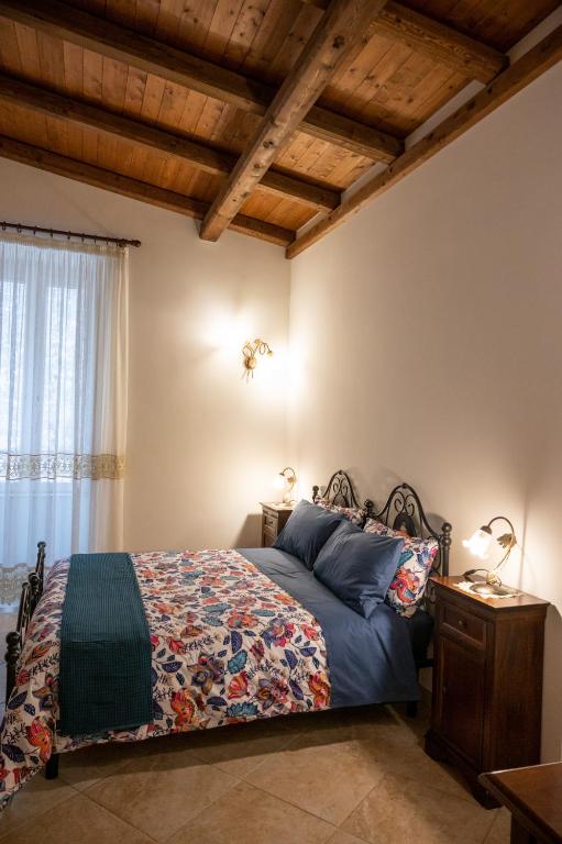 Postel nebo postele na pokoji v ubytování Corcioli B&B