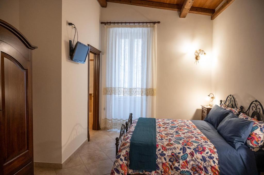 Postel nebo postele na pokoji v ubytování Corcioli B&B