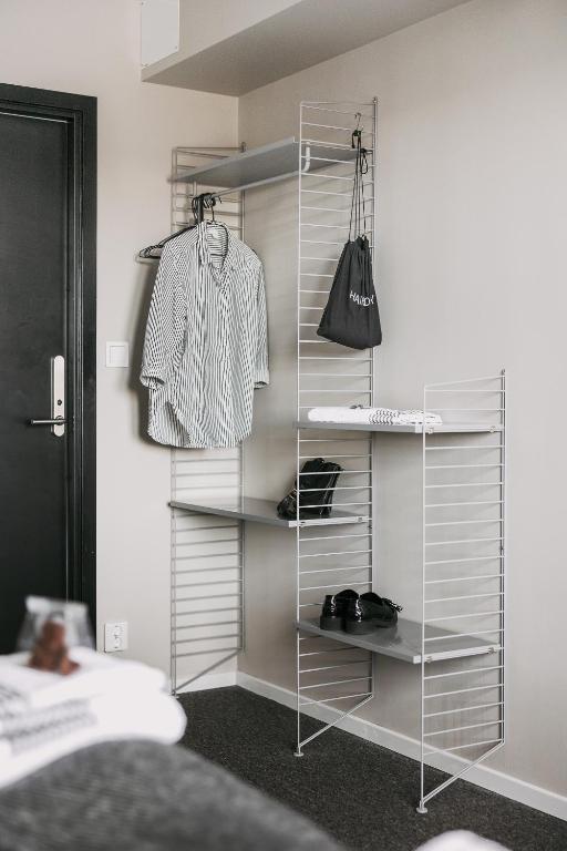 Postel nebo postele na pokoji v ubytování BriQ Hotell