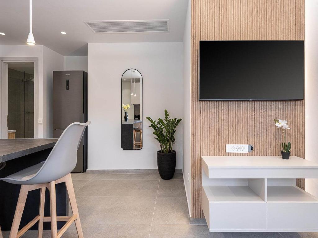A television and/or entertainment centre at Casa D'Irene Apts