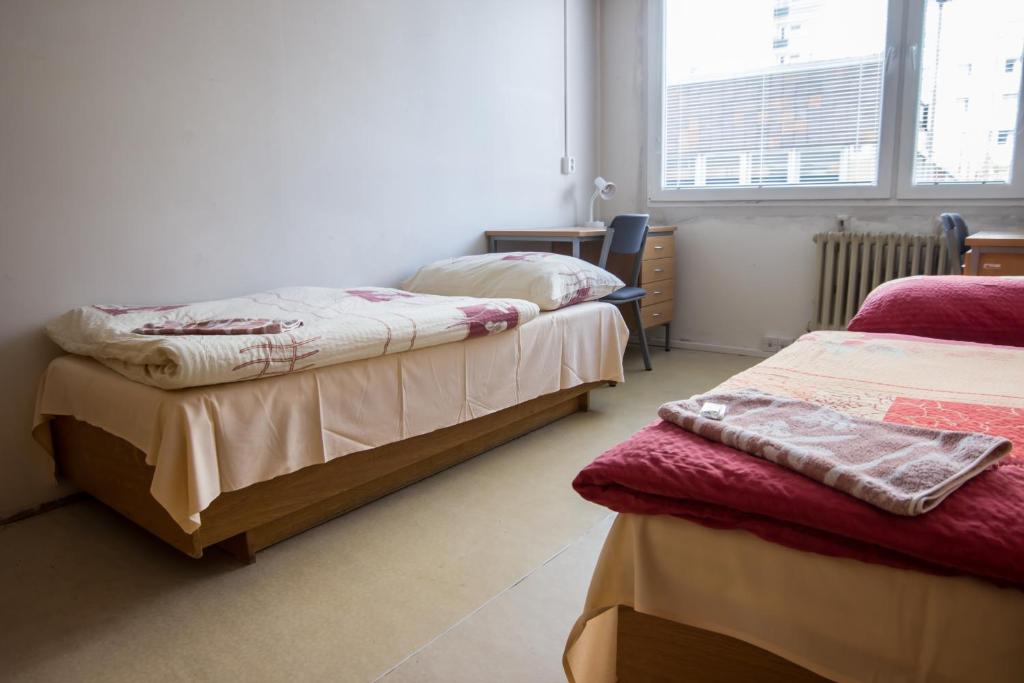 Voodi või voodid majutusasutuse Hostel Blanice toas