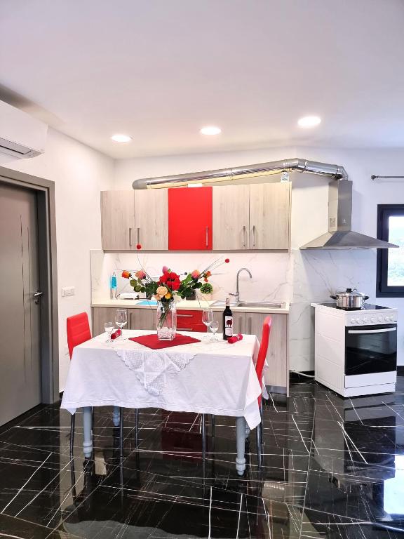 Kuchyň nebo kuchyňský kout v ubytování Istron Corner Apartments