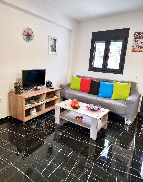 TV a/nebo společenská místnost v ubytování Istron Corner Apartments