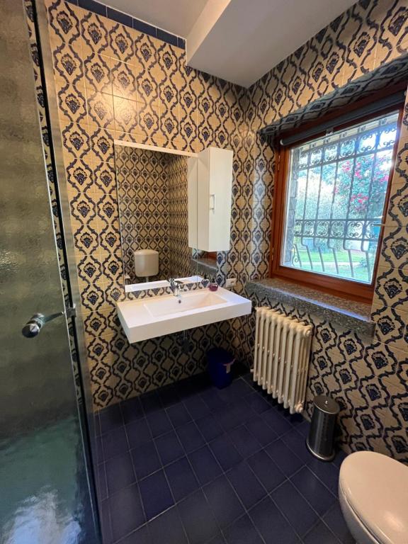 Koupelna v ubytování Bella Vita Guesthouse -parcheggio privato interno