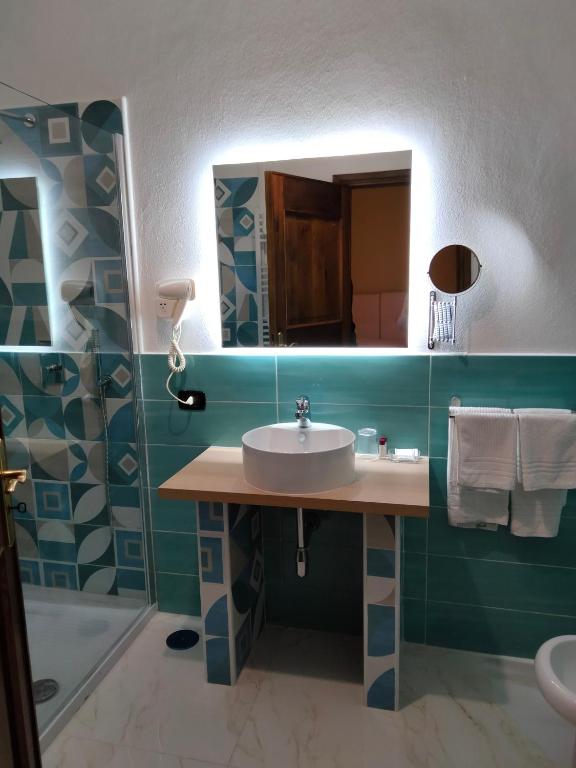 Kúpeľňa v ubytovaní Dante Rooms