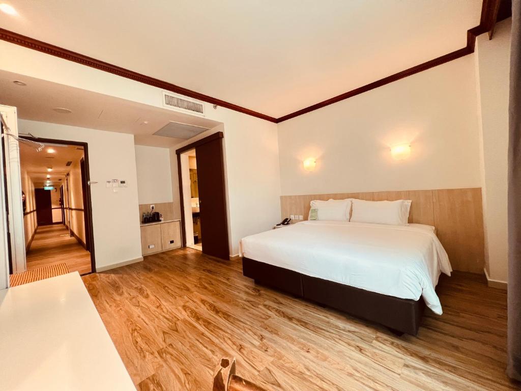 Postel nebo postele na pokoji v ubytování Park View Hotel