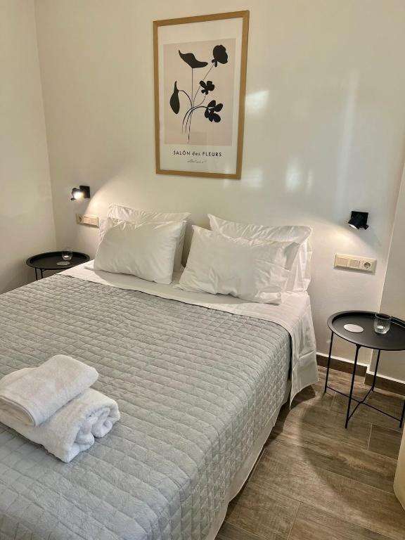 A bed or beds in a room at Friday Collection