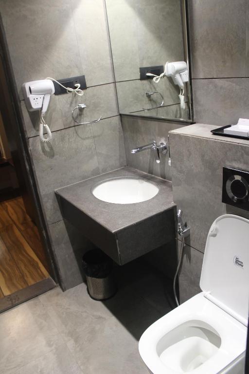 Koupelna v ubytování Hotel Rudra Royals