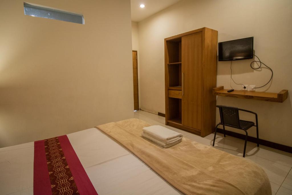 Kuta Suci Guesthouse - Standard Twin Room