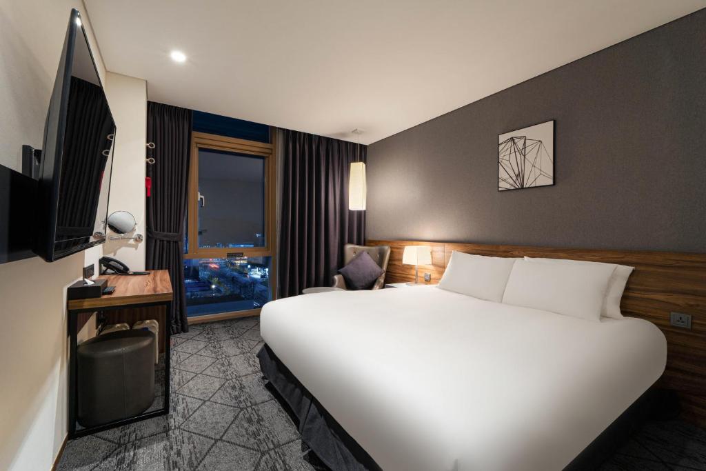 TV a/nebo společenská místnost v ubytování Staz Hotel Ulsan
