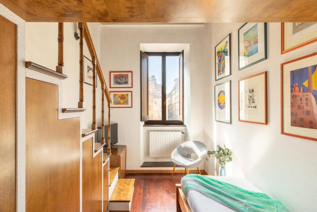 Łóżko lub łóżka w pokoju w obiekcie iFlat Lovely flat in Navona
