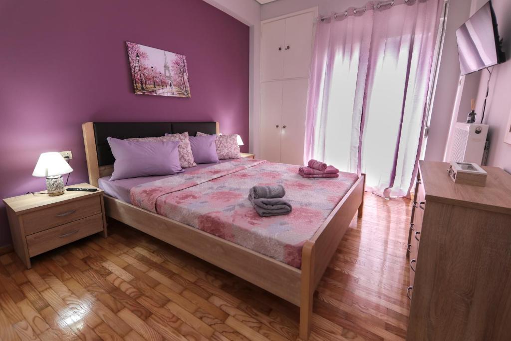 Ένα ή περισσότερα κρεβάτια σε δωμάτιο στο Stay Here - Διαμέρισμα στο κέντρο του Βόλου