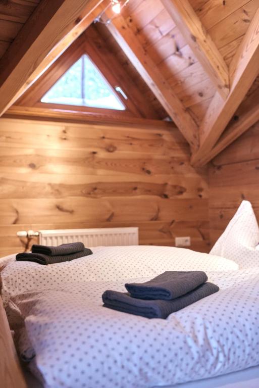 Postel nebo postele na pokoji v ubytování MOUNTAINRANGER - Lodge - ski in & ski out