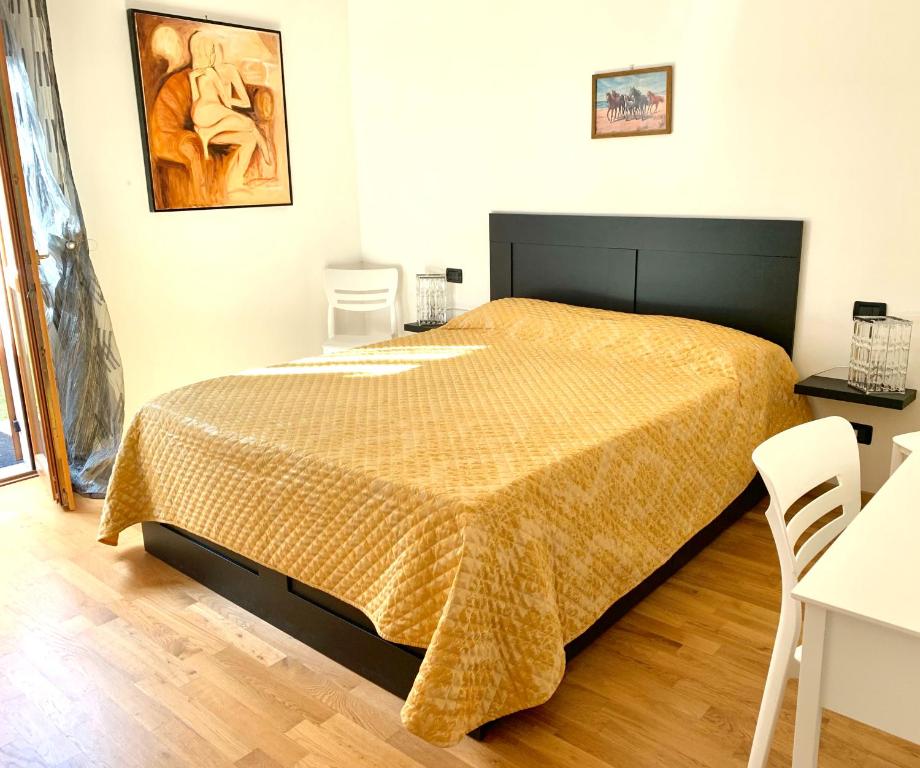A bed or beds in a room at Casa Alice