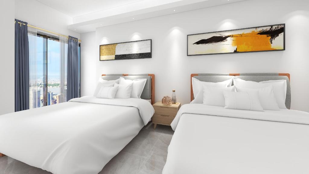 Postel nebo postele na pokoji v ubytování Foshan Laide Apartment