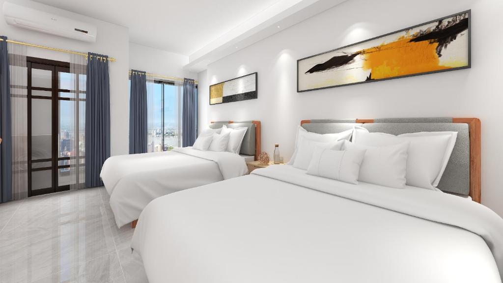 Postel nebo postele na pokoji v ubytování Foshan Laide Apartment