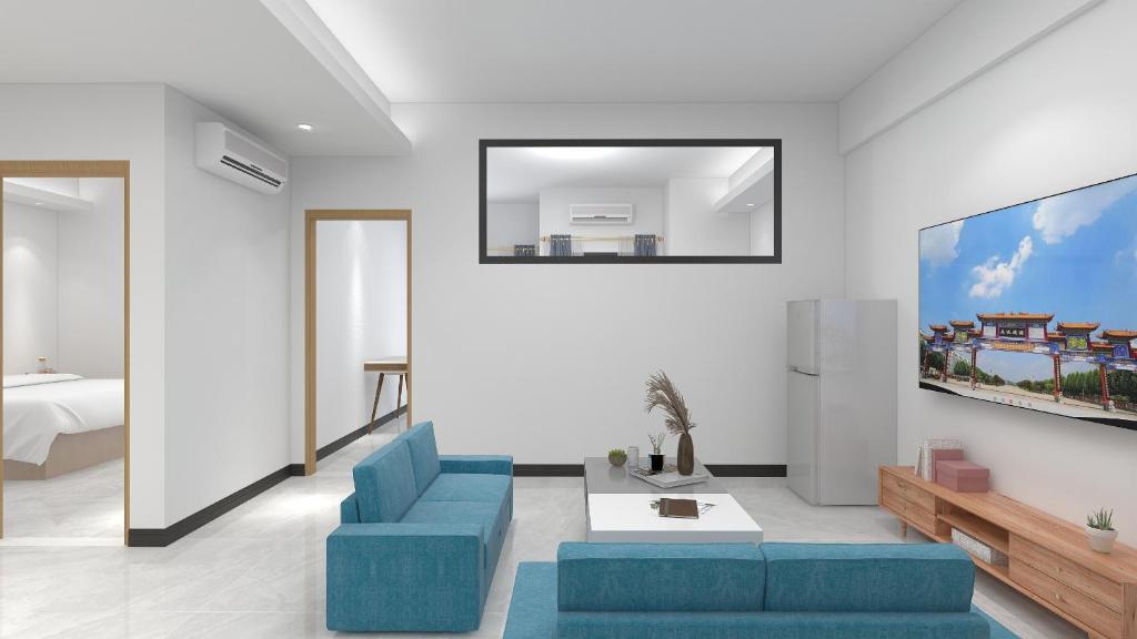 TV a/nebo společenská místnost v ubytování Foshan Laide Apartment