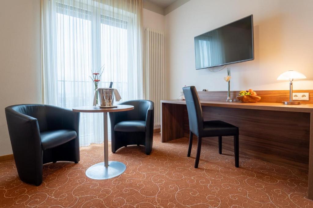 TV a/nebo společenská místnost v ubytování Hotel St Georg - Regensburg