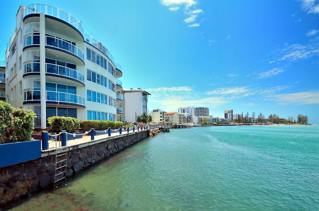 a large body of water surrounded by buildings at Watermark Resort Caloundra in Caloundra