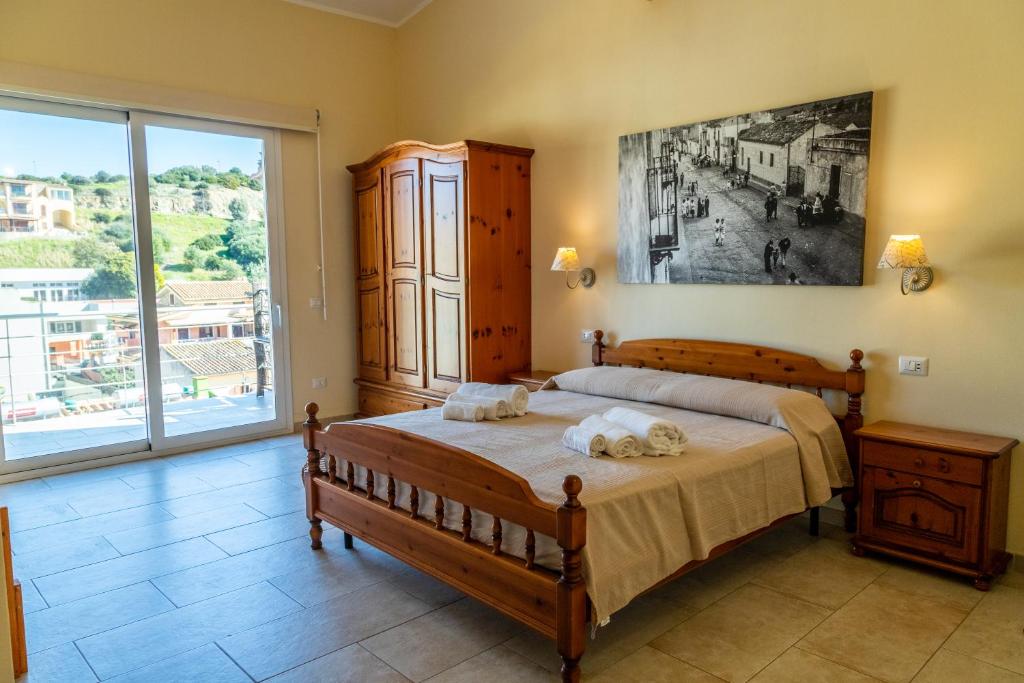 Postel nebo postele na pokoji v ubytování Casa Tacconi