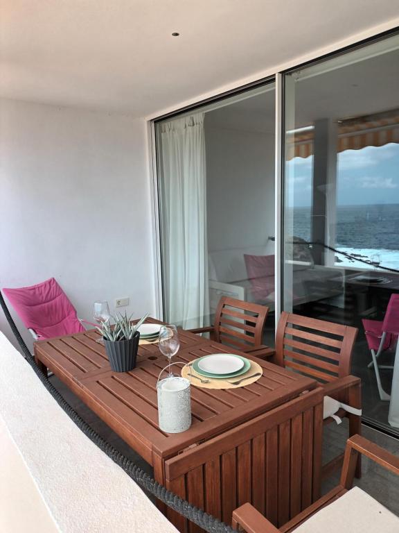 A seating area at Great oportunity Costa Adeje Holiday apartment first sea line Free Wifi
