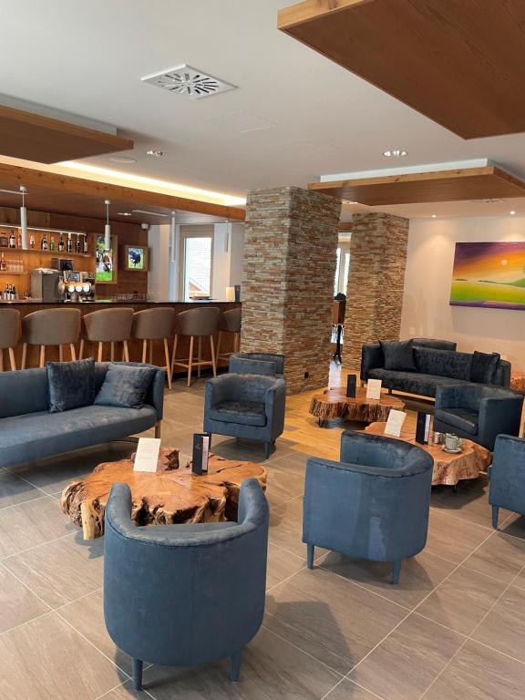 Posezení v ubytování Boutique hôtel Corbetta - SPA 60m2 - La montagne à 5 minutes de l'autoroute A12 aux Paccots sur Montreux - NOUVEAU Loft familial - Profitez du Lac Léman et des montagnes en même temps