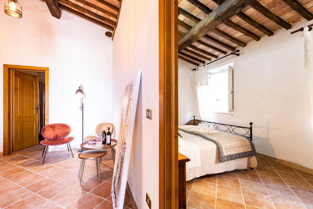 Postel nebo postele na pokoji v ubytování Agri Apartment La Terrazza La Ripadoro