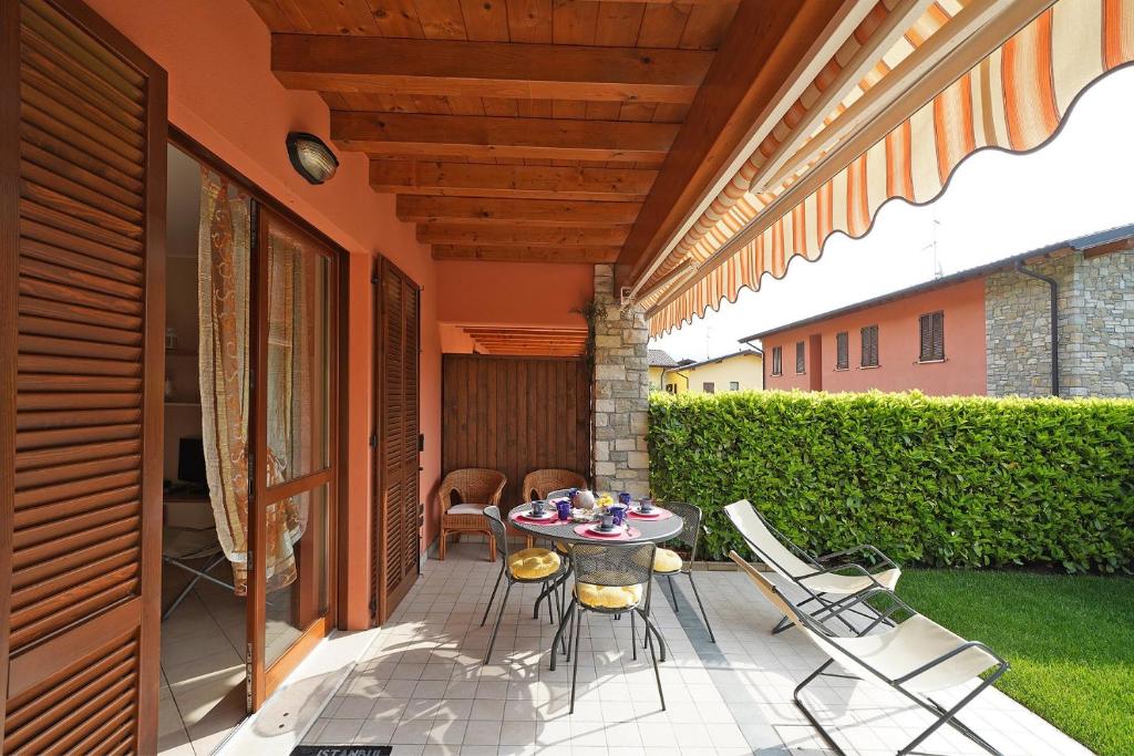 A patio or other outdoor area at Messaga