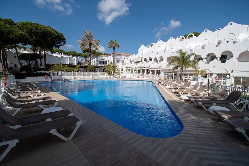 Bazén v ubytovaní CasaDelSol-Marbella-Słońce,piasek,szmaragdowa woda alebo v jeho blízkosti