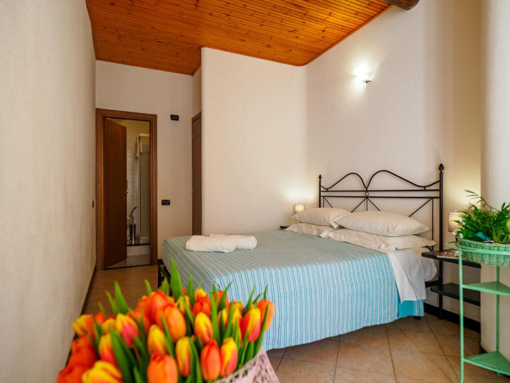 Postel nebo postele na pokoji v ubytování Macaia Room #2 with AC