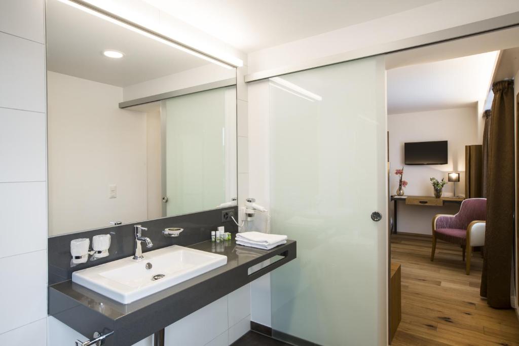 Koupelna v ubytování Romantik Hotel le Vignier