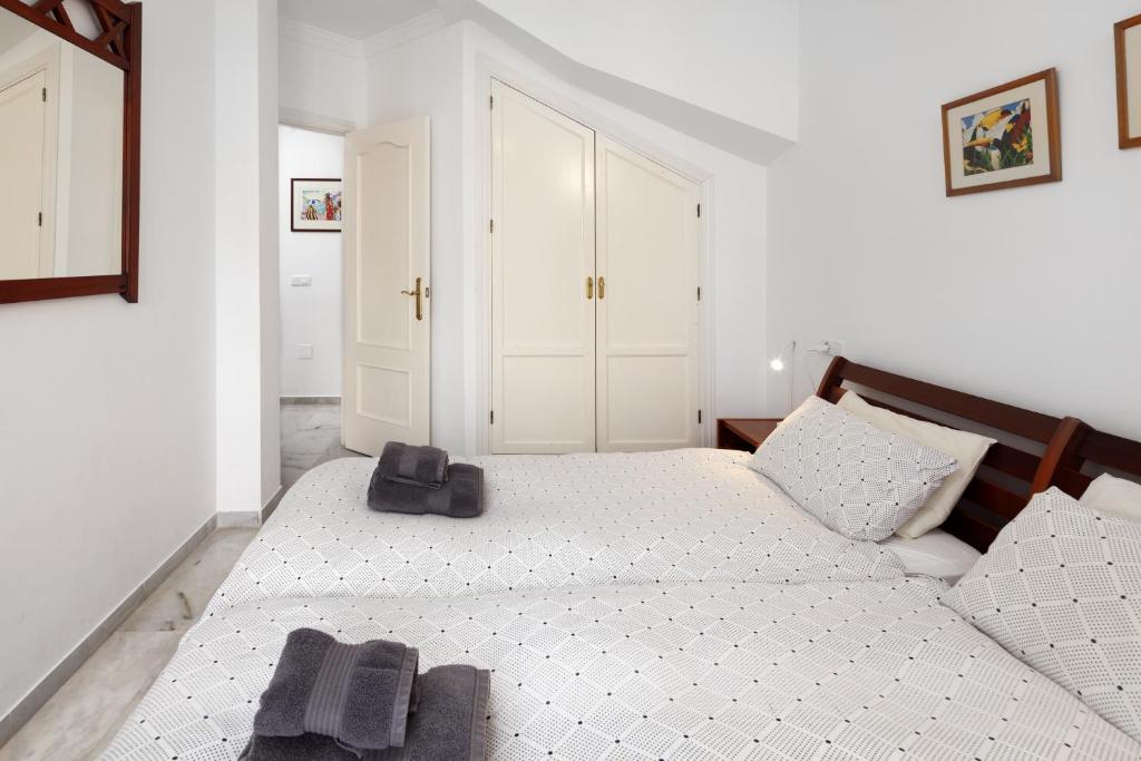 Łóżko lub łóżka w pokoju w obiekcie Villa Miramar Burriana Beach 10 pax