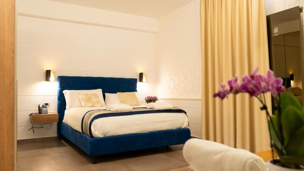 Letto o letti in una camera di Resort & Winery Bosco De Medici