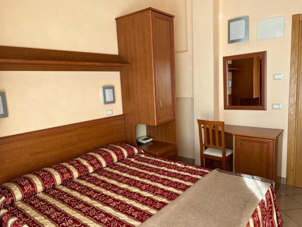 Postel nebo postele na pokoji v ubytování Hotel Bristol - Koolibry Hotels