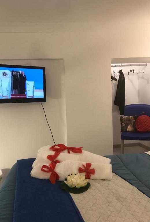 Postel nebo postele na pokoji v ubytování La Suite sul Mare