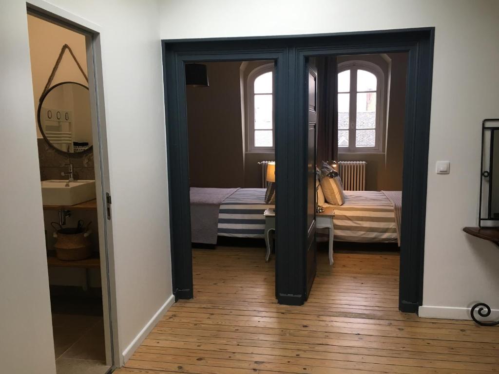 Postel nebo postele na pokoji v ubytování Maison Ulysse