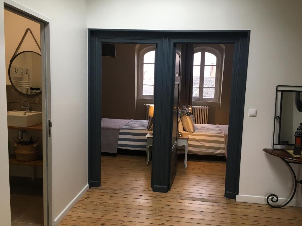 Postel nebo postele na pokoji v ubytování Maison Ulysse