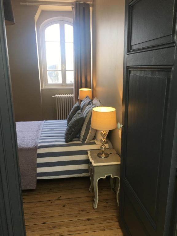 Postel nebo postele na pokoji v ubytování Maison Ulysse