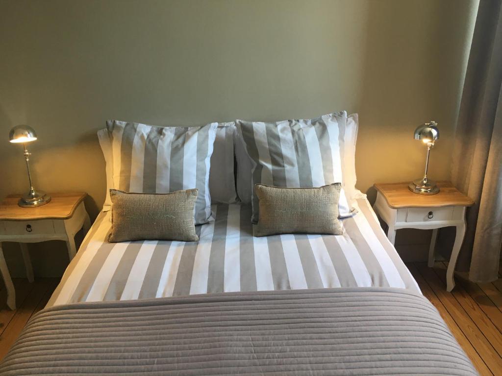 Postel nebo postele na pokoji v ubytování Maison Ulysse