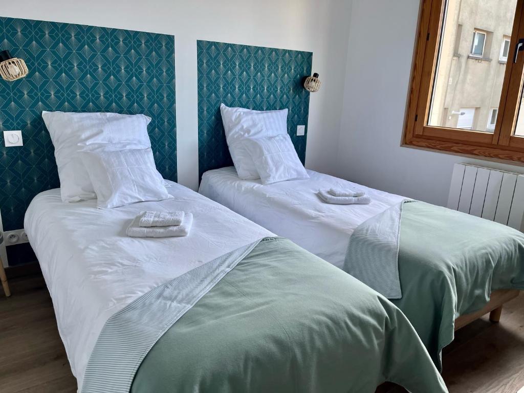 Posteľ alebo postele v izbe v ubytovaní La Galonière Noire, appartement vue mer