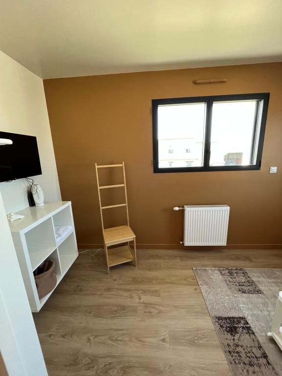 Telewizja i/lub zestaw kina domowego w obiekcie La Belle Mélorienne