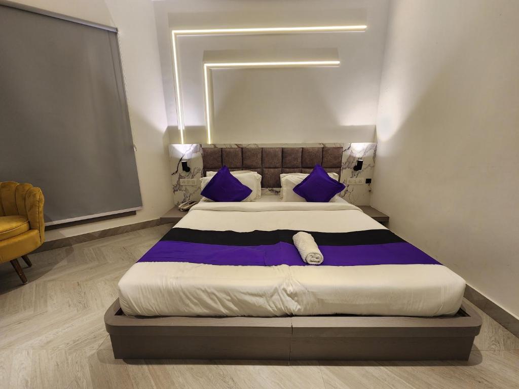 Postel nebo postele na pokoji v ubytování Square9 - A Boutique Hotel